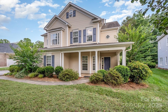 7731 Sedgebrook Dr E, Stanley, NC 28164 - traditional-style home with a front yard and a porch