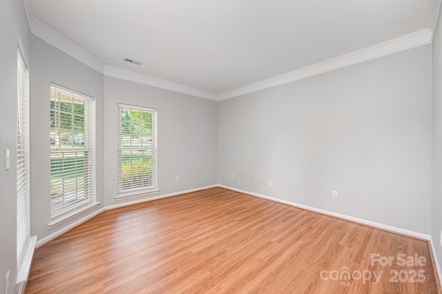 7731 Sedgebrook Dr E, Stanley, NC 28164 - empty room with light wood-style flooring and ornamental molding