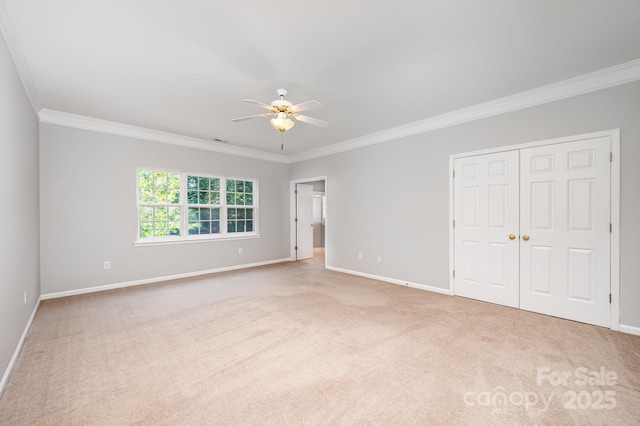 7731 Sedgebrook Dr E, Stanley, NC 28164 - unfurnished bedroom with ornamental molding, carpet floors, a closet, and ceiling fan