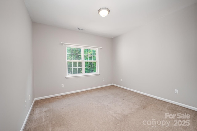 7731 Sedgebrook Dr E, Stanley, NC 28164 - carpeted spare room with baseboards