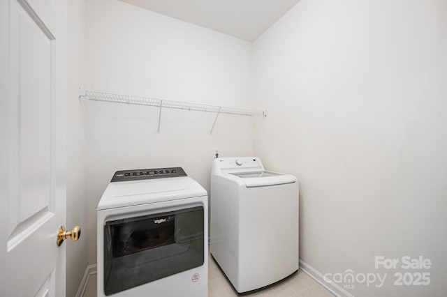 7731 Sedgebrook Dr E, Stanley, NC 28164 - washroom featuring washer and clothes dryer and baseboards