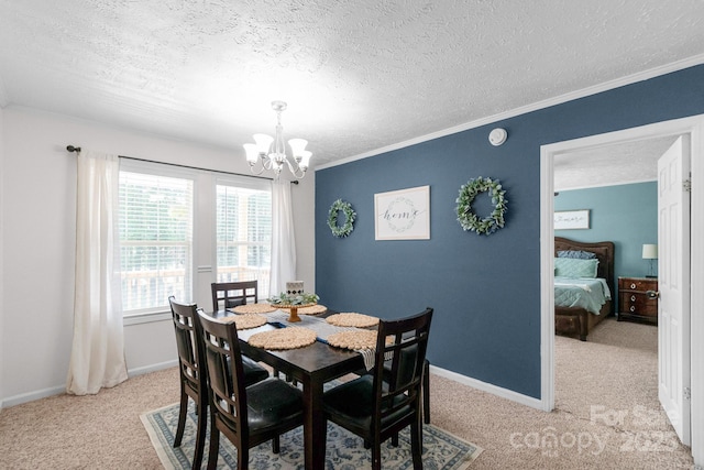 5701 Lockhart Rd, Kershaw, SC 29067 - dining space featuring carpet floors, a chandelier, a textured ceiling, and ornamental molding