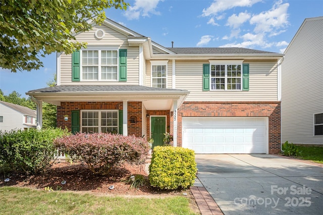 4732 Meadowfield Rd Unit L35, Charlotte, NC 28215 - traditional-style house with brick siding, a garage, and concrete driveway