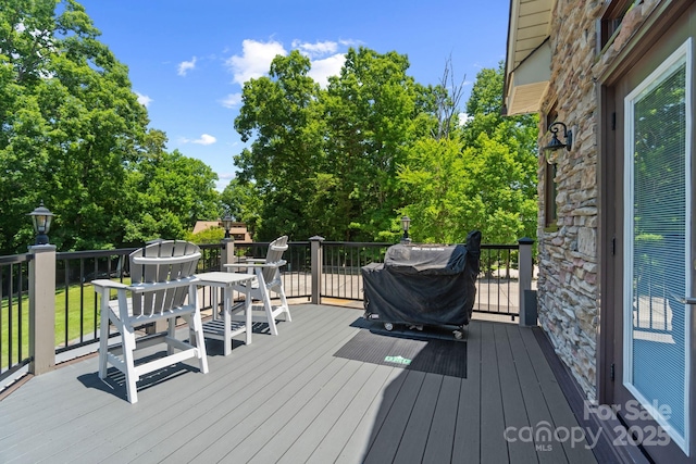 313 Sunset View Ct, York, SC 29745 - wooden deck with a grill and view of wooded area