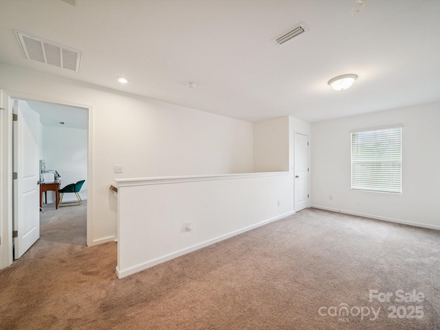 3077 Light Ridge Ct SW, Concord, NC 28027 - carpeted empty room with baseboards