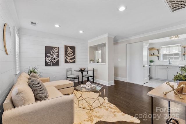 404 Wakefield Dr Unit C, Charlotte, NC 28209 - living area featuring wood finished floors, recessed lighting, and crown molding