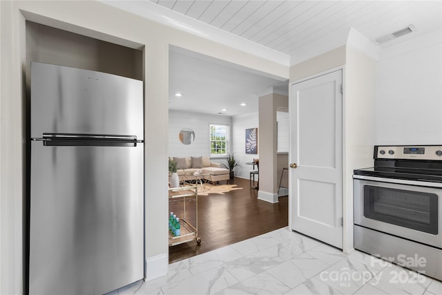404 Wakefield Dr Unit C, Charlotte, NC 28209 - kitchen featuring stainless steel appliances, light marble finish floors, and recessed lighting