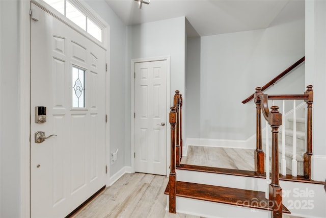 713 Torrey Pines Ln, Fort Mill, SC 29715 - foyer with light wood-style floors, plenty of natural light, and stairs