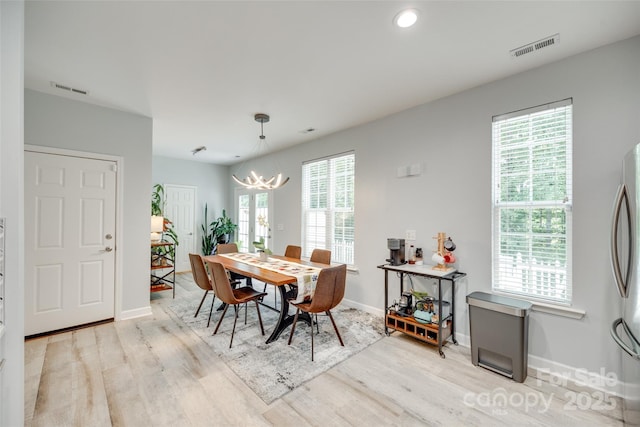 713 Torrey Pines Ln, Fort Mill, SC 29715 - dining area with a chandelier, light wood-style flooring, and recessed lighting