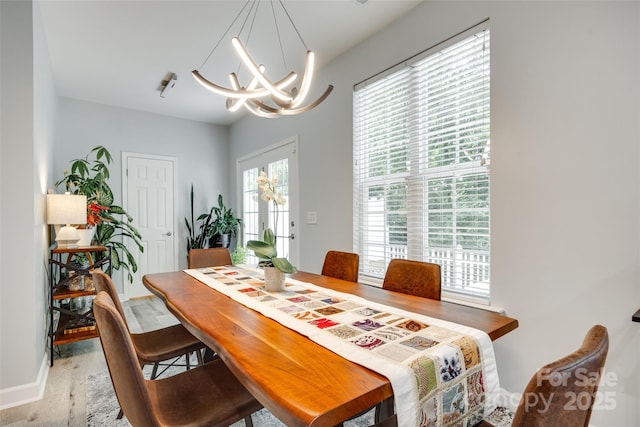 713 Torrey Pines Ln, Fort Mill, SC 29715 - dining space featuring a chandelier and baseboards
