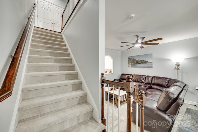 713 Torrey Pines Ln, Fort Mill, SC 29715 - staircase featuring ceiling fan and arched walkways