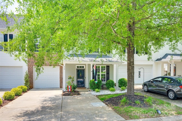 713 Torrey Pines Ln, Fort Mill, SC 29715 - multi unit property featuring driveway, a garage, a porch, and brick siding