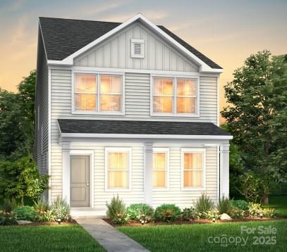 14020 Penbury Ln Unit 329, Charlotte, NC 28278 - view of front facade with a shingled roof and board and batten siding