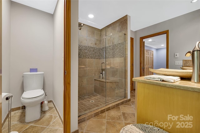 16 Due W Rd, Hendersonville, NC 28792 - bathroom featuring a shower stall, recessed lighting, stone tile floors, and vanity