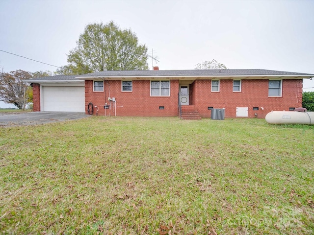 3113 Old Pageland Marshville Rd, Wingate, NC 28174 - back of house featuring crawl space, a garage, entry steps, and brick siding