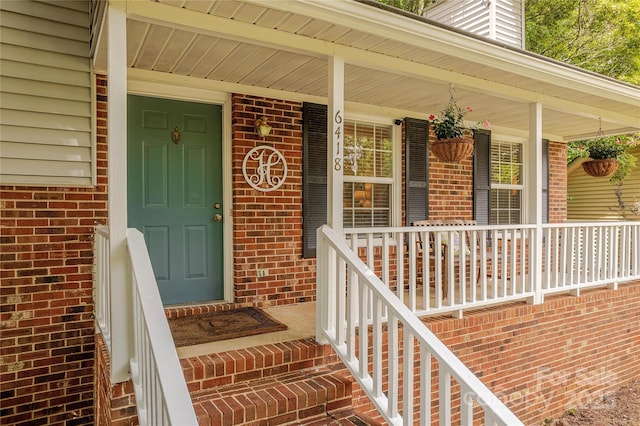 6418 Tivoli Ct, Charlotte, NC 28211 - property entrance featuring brick siding and a porch