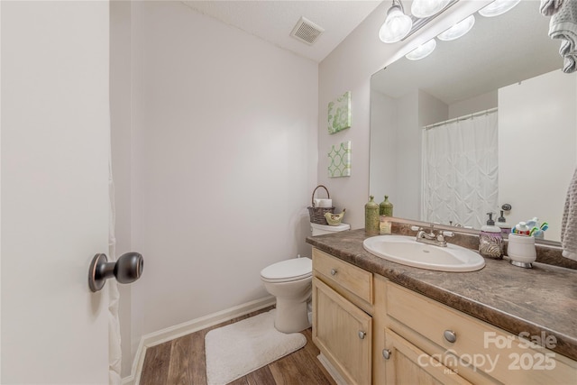 6418 Tivoli Ct, Charlotte, NC 28211 - bathroom with wood finished floors and vanity