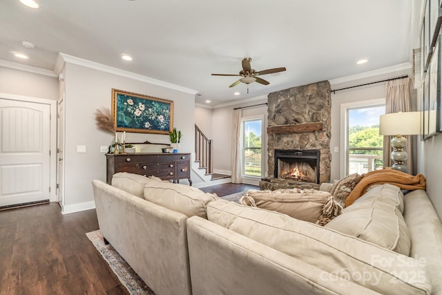7805 Crooked Creek Church Rd, Monroe, NC 28110 - living area with recessed lighting, dark wood-type flooring, a stone fireplace, crown molding, and stairway