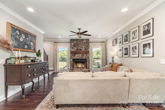 7805 Crooked Creek Church Rd, Monroe, NC 28110 - living room with dark wood finished floors, crown molding, ceiling fan, a stone fireplace, and recessed lighting