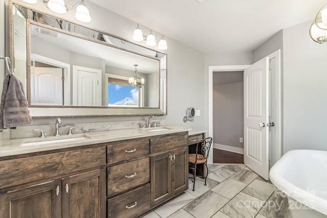 7805 Crooked Creek Church Rd, Monroe, NC 28110 - bathroom with double vanity, a soaking tub, and marble finish floors