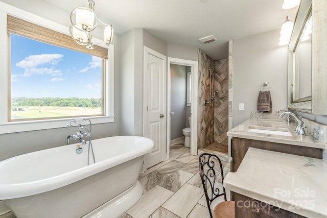 7805 Crooked Creek Church Rd, Monroe, NC 28110 - full bathroom with a shower stall, a freestanding bath, double vanity, and marble look tile flooring