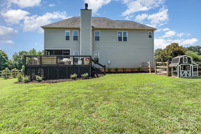 7805 Crooked Creek Church Rd, Monroe, NC 28110 - rear view of house featuring a wooden deck, a storage unit, and a chimney