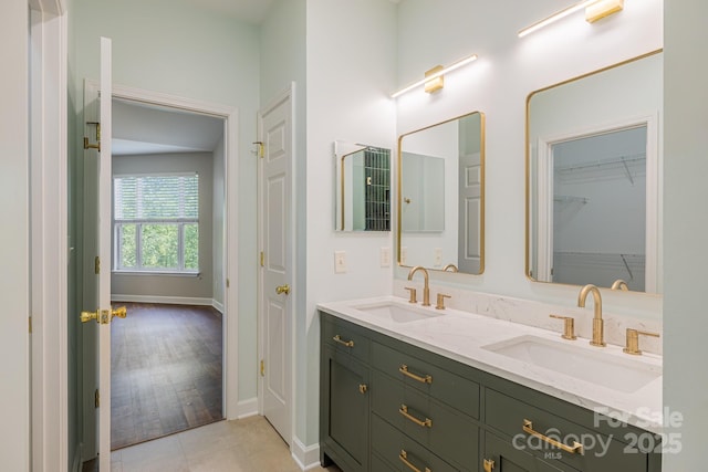 795 Peninsula Dr, Davidson, NC 28036 - bathroom with double vanity and tile patterned flooring