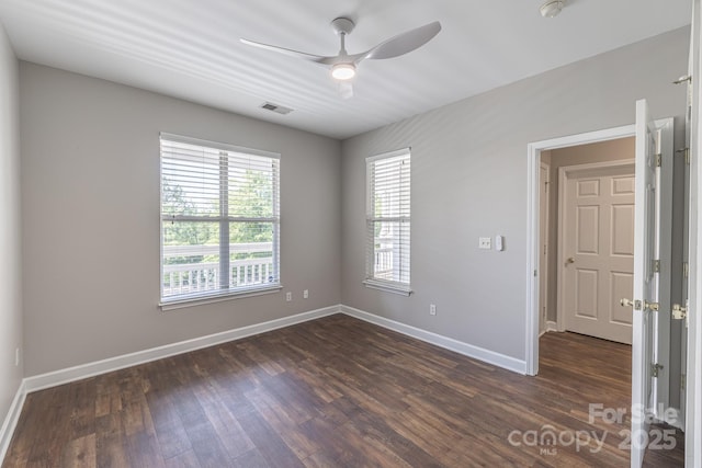 795 Peninsula Dr, Davidson, NC 28036 - spare room with healthy amount of natural light, a ceiling fan, dark wood finished floors, and a smoke detector
