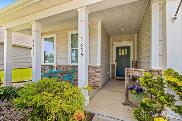 3835 Norman View Dr, Sherrills Ford, NC 28673 - doorway to property with covered porch and stone siding