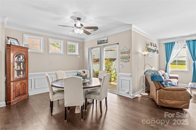 3835 Norman View Dr, Sherrills Ford, NC 28673 - dining area featuring a ceiling fan, crown molding, dark wood-style floors, a wainscoted wall, and a decorative wall