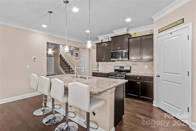 3835 Norman View Dr, Sherrills Ford, NC 28673 - kitchen featuring stainless steel appliances, a kitchen bar, an island with sink, tasteful backsplash, and light stone counters