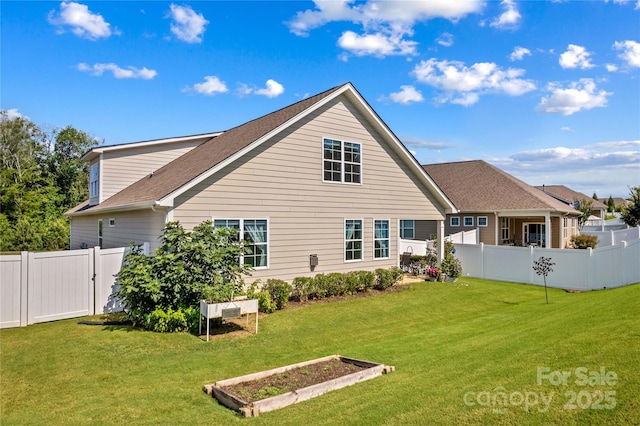 3835 Norman View Dr, Sherrills Ford, NC 28673 - back of property with a vegetable garden, a fenced backyard, and roof with shingles