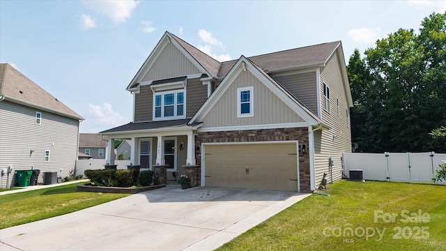 12704 Franklin Square Rd, Charlotte, NC 28213 - craftsman inspired home with board and batten siding, a gate, stone siding, and an attached garage