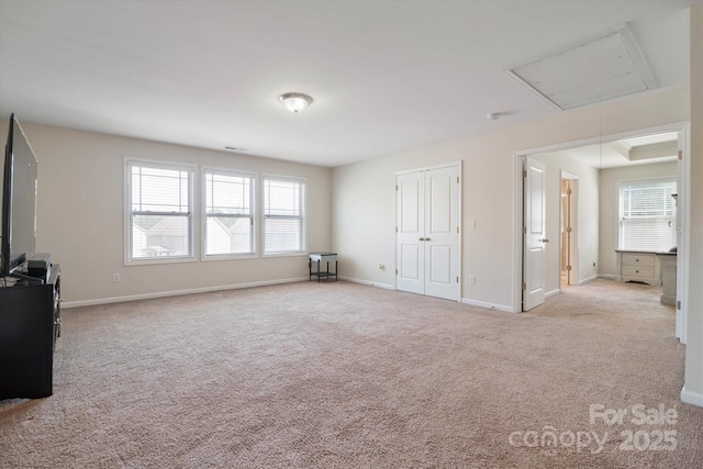 12704 Franklin Square Rd, Charlotte, NC 28213 - unfurnished living room with attic access and carpet floors