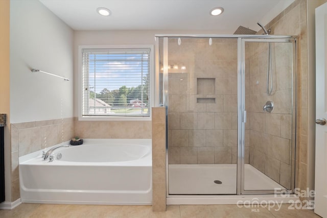 12704 Franklin Square Rd, Charlotte, NC 28213 - bathroom with a bath, a shower stall, tile patterned flooring, and recessed lighting