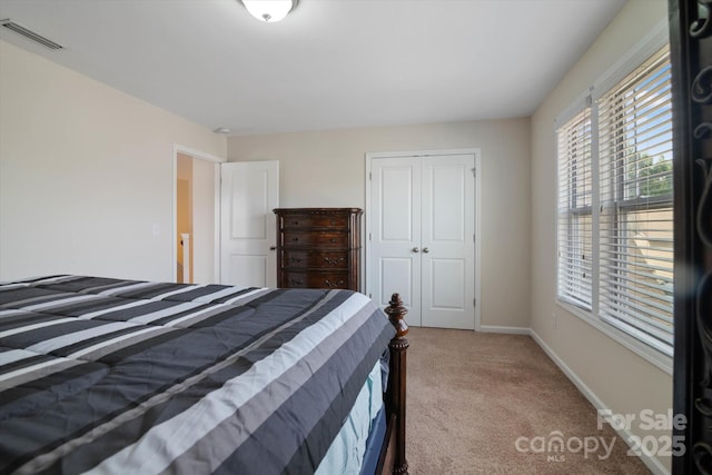 12704 Franklin Square Rd, Charlotte, NC 28213 - carpeted bedroom featuring a closet and baseboards