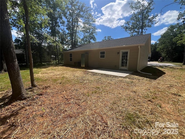 507 Putter Pl, Chester, SC 29706 - back of house featuring a patio area and a lawn
