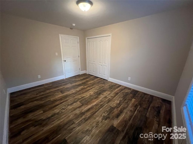 507 Putter Pl, Chester, SC 29706 - unfurnished bedroom featuring dark wood-style floors and a closet