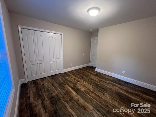 507 Putter Pl, Chester, SC 29706 - unfurnished bedroom featuring dark wood-style floors and a closet