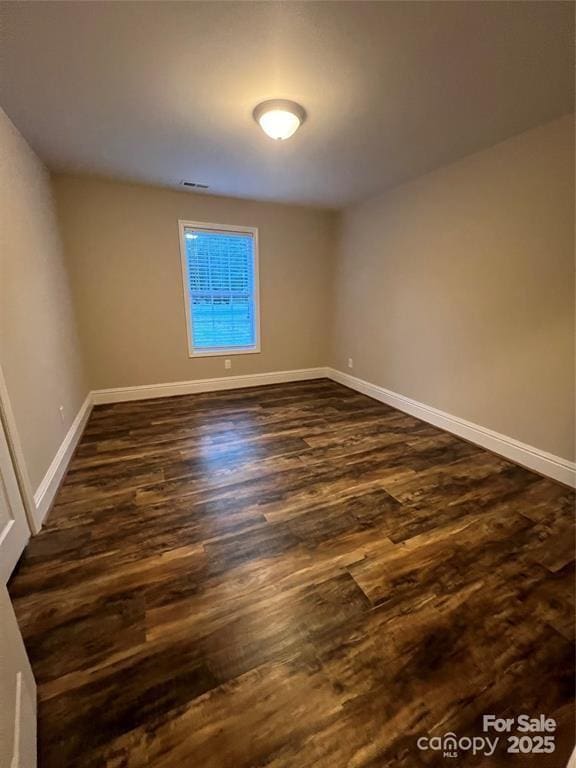 507 Putter Pl, Chester, SC 29706 - empty room with dark wood-style flooring and baseboards
