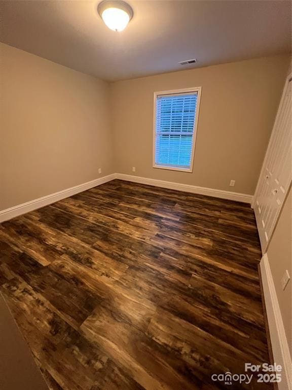 507 Putter Pl, Chester, SC 29706 - unfurnished bedroom featuring dark wood-style floors and baseboards