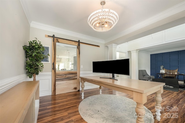2380 Fairport Dr SE, Concord, NC 28025 - home office with ornamental molding, dark wood-type flooring, a barn door, a chandelier, and a wainscoted wall
