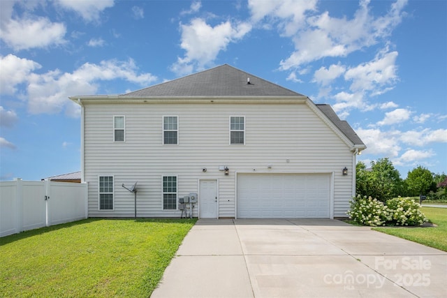2380 Fairport Dr SE, Concord, NC 28025 - rear view of property with driveway and an attached garage