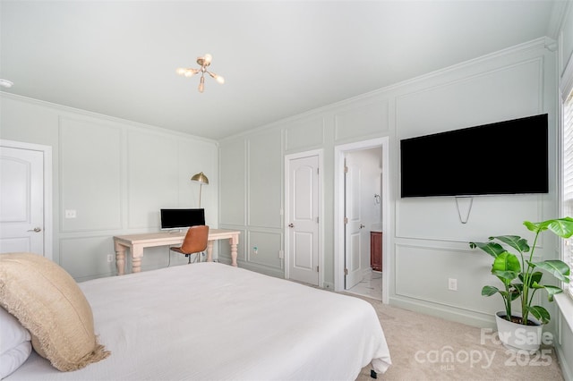 2380 Fairport Dr SE, Concord, NC 28025 - bedroom with a decorative wall, ensuite bath, light carpet, a chandelier, and ornamental molding