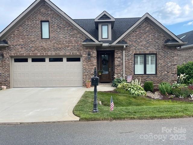 6176 Gold Springs Way, Denver, NC 28037 - traditional-style house with brick siding, driveway, and a garage