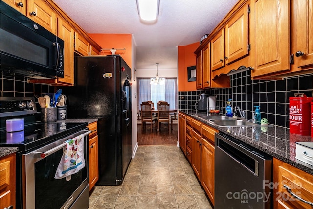 958 Hillard Ln, Lincolnton, NC 28092 - kitchen featuring stainless steel electric range, dishwasher, black microwave, brown cabinets, and tasteful backsplash