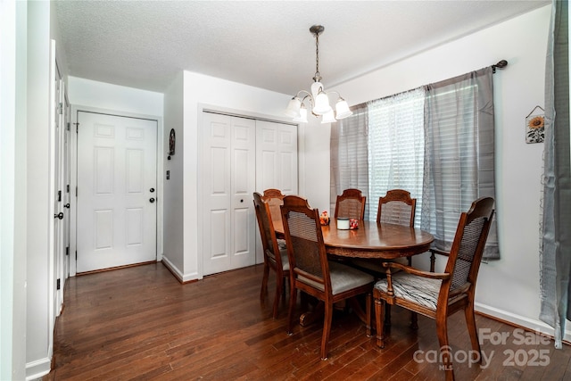 958 Hillard Ln, Lincolnton, NC 28092 - dining room with a chandelier and dark wood-style floors
