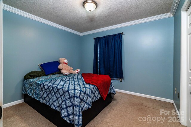 958 Hillard Ln, Lincolnton, NC 28092 - carpeted bedroom featuring a textured ceiling and ornamental molding