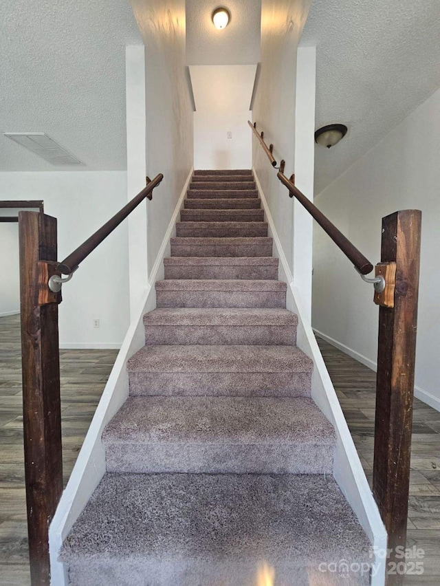 11 Long Glen Ct Unit 113, Columbia, SC 29229 - staircase with a textured ceiling and wood finished floors