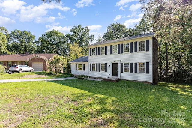 80 Lecline Cir NE, Concord, NC 28025 - colonial inspired home featuring a front yard and a garage
